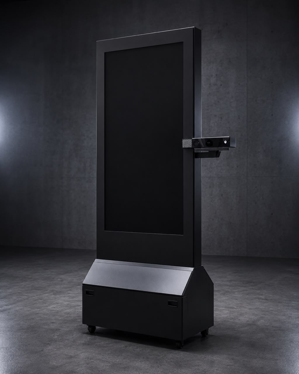 The Vagora Mirror in a dark studio: a tall black-framed vertical screen with its sensing hardware on the right edge, standing on a black base with casters